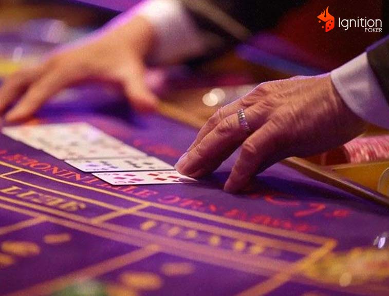 baccarat chemin fer Mesa de Baccarat com o banqueiro mexendo nas cartas