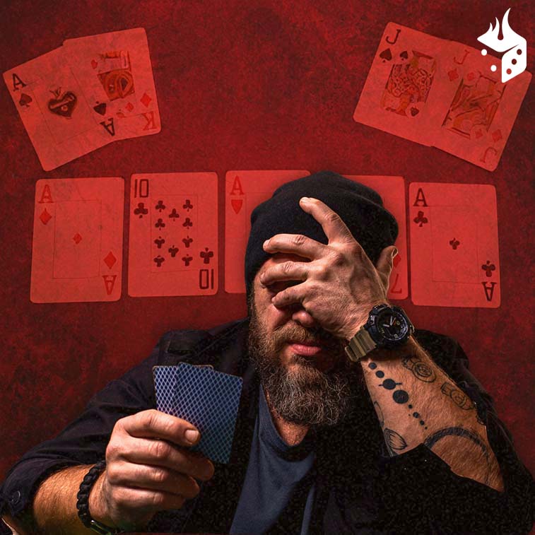 poker bad beat Homem com duas cartas de poker em uma mão